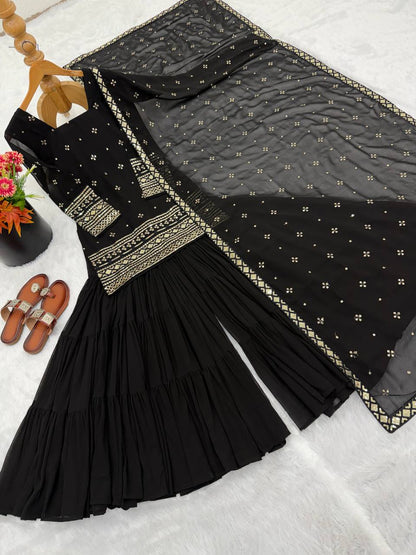 Arti Chauhan Black Color Georgette Top With Ruffle Sharara And Dupatta Set