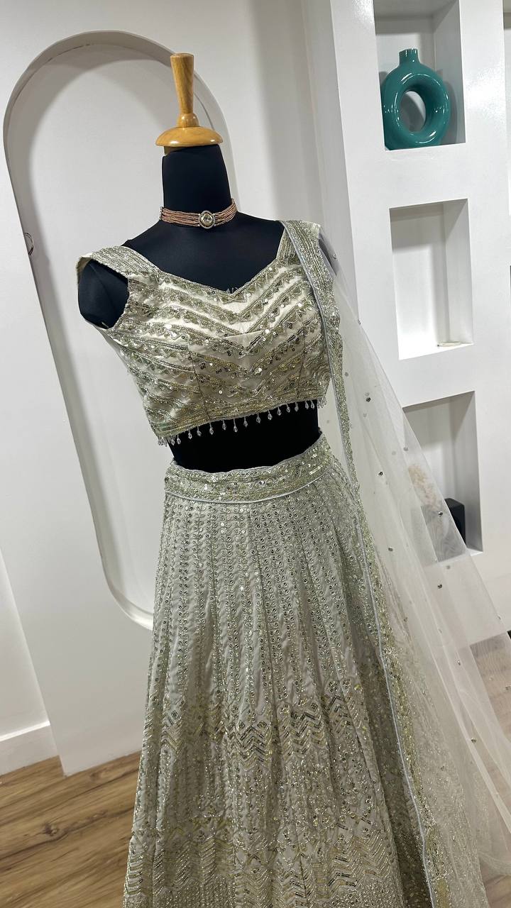 Bollywood Style White Color Georgette Lehenga With Sequins Dori Work Designer Lehenga Choli