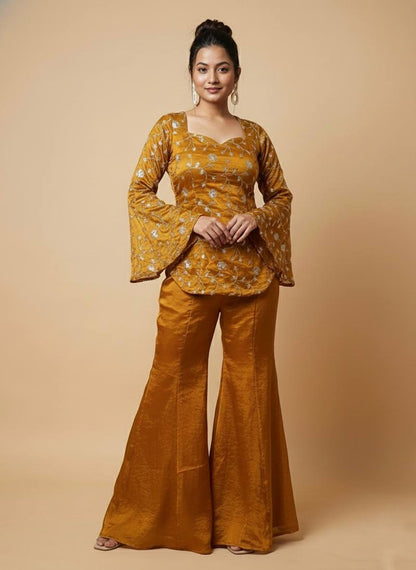 Wedding Wear Mustard Color Fandy Silk Top And Palazzo Set