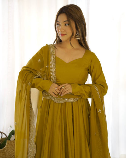 Party Wear Mustard Color Heavy Pure Roman Silk Plain Designer Gown With Work Dupatta