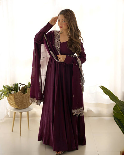 Party Wear Wine Color Heavy Pure Roman Silk Plain Designer Gown With Work Dupatta