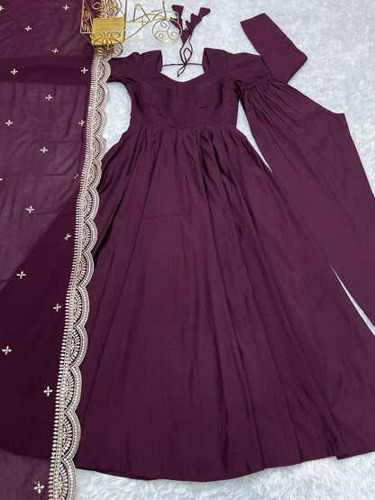 Party Wear Wine Color Heavy Pure Roman Silk Plain Designer Gown With Work Dupatta