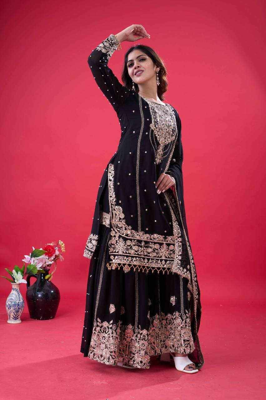 Party Wear Black Color Rivet Moti Work Georgette Sharara Suit