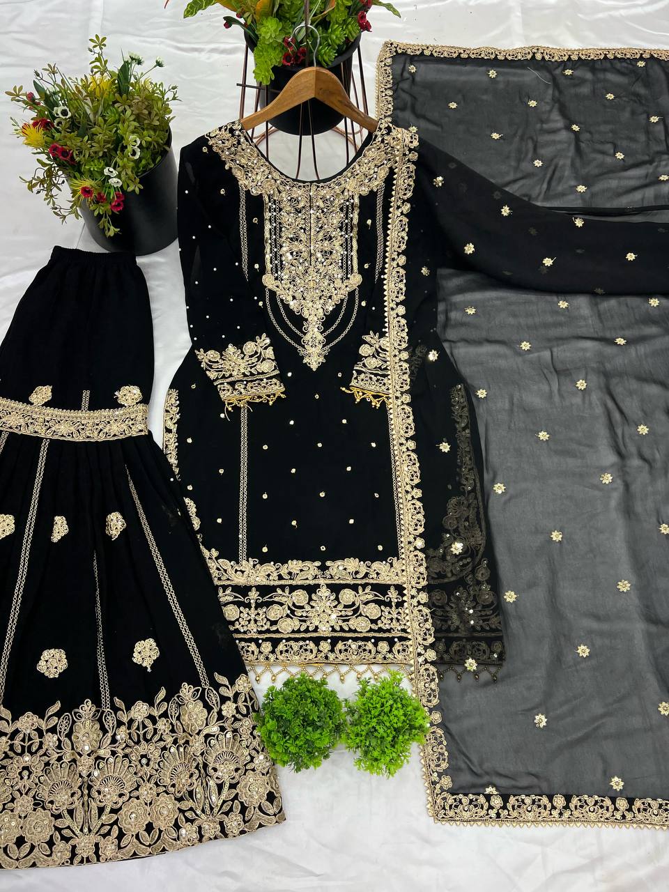 Party Wear Black Color Rivet Moti Work Georgette Sharara Suit