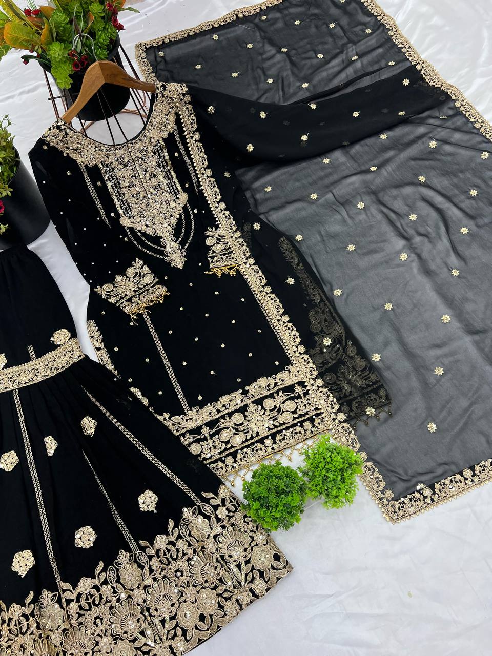 Party Wear Black Color Rivet Moti Work Georgette Sharara Suit