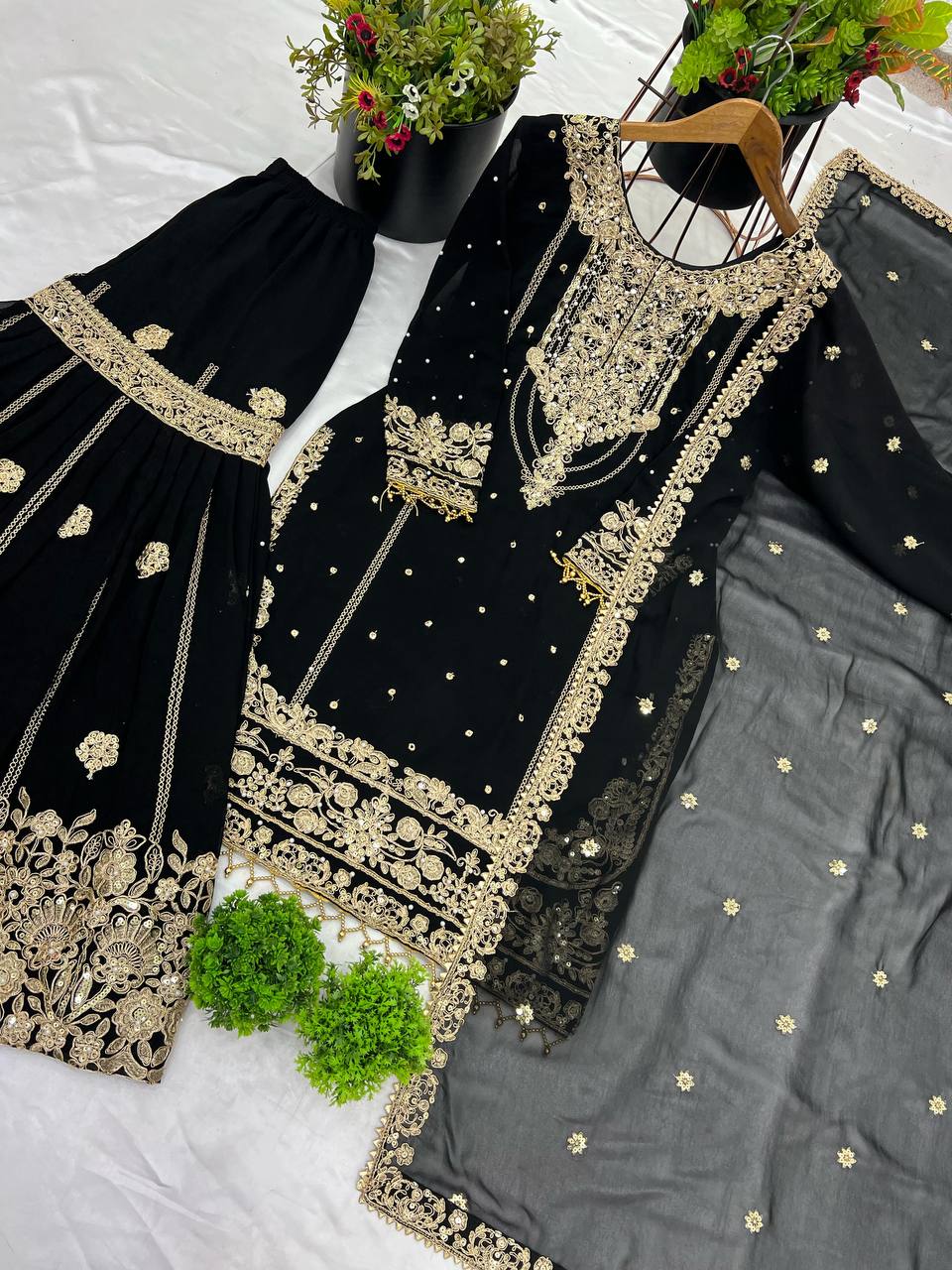 Party Wear Black Color Rivet Moti Work Georgette Sharara Suit