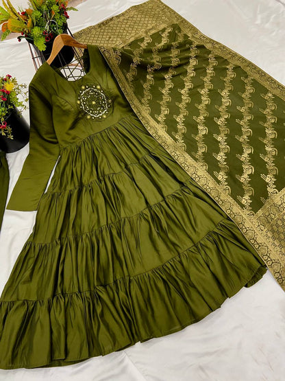 Reception Wear Mahendi Green Color Heavy Roman Silk With Embroidery Sequence Work Anarkali Gown
