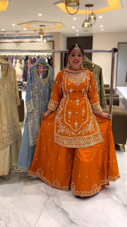 Festive Wear Orange Color Natural Crep Material With Sequence Embroidery Work Sharara Suit