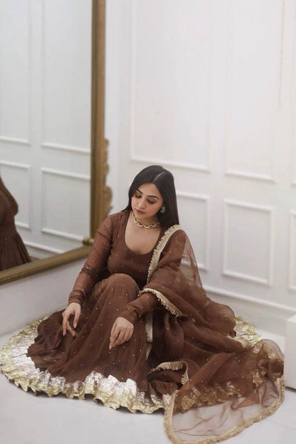 Festive Wear Brown Color Heavy Faux Georgette Moti Work Beautiful Gown