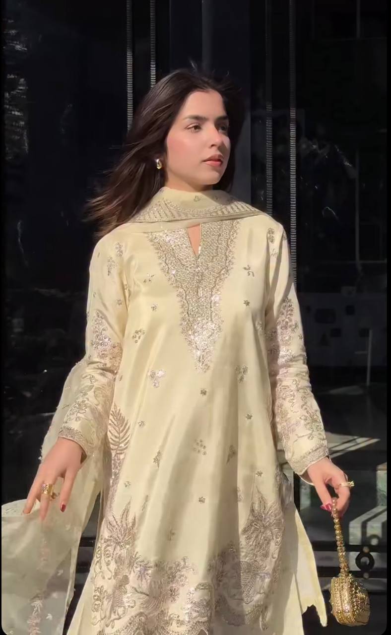 Presenting Off White Color Sequence Embroidered Sharara Suit With Dupatta