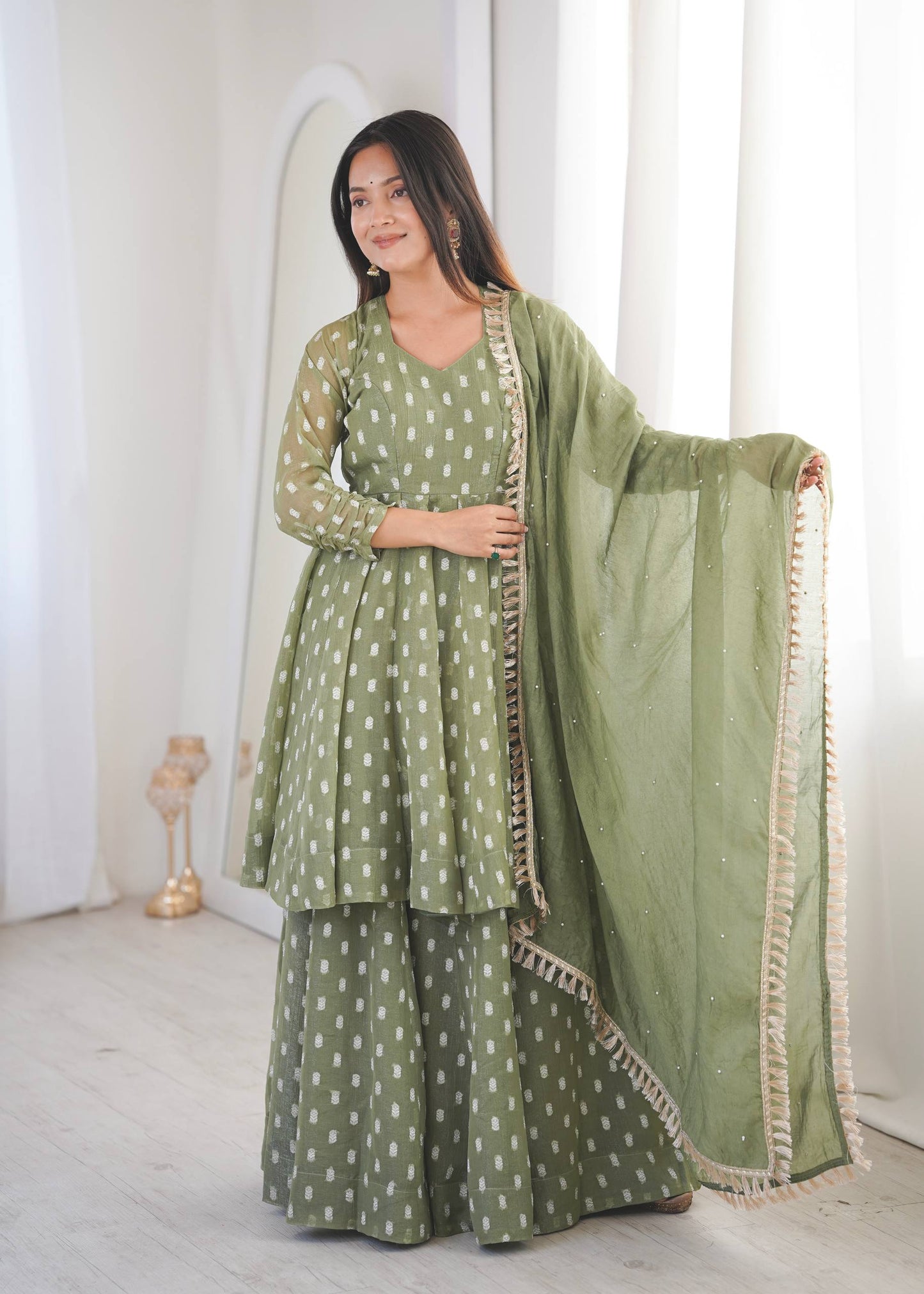 Eyes Catching Green Color Heavy Crunchy Silk Sharara Suit