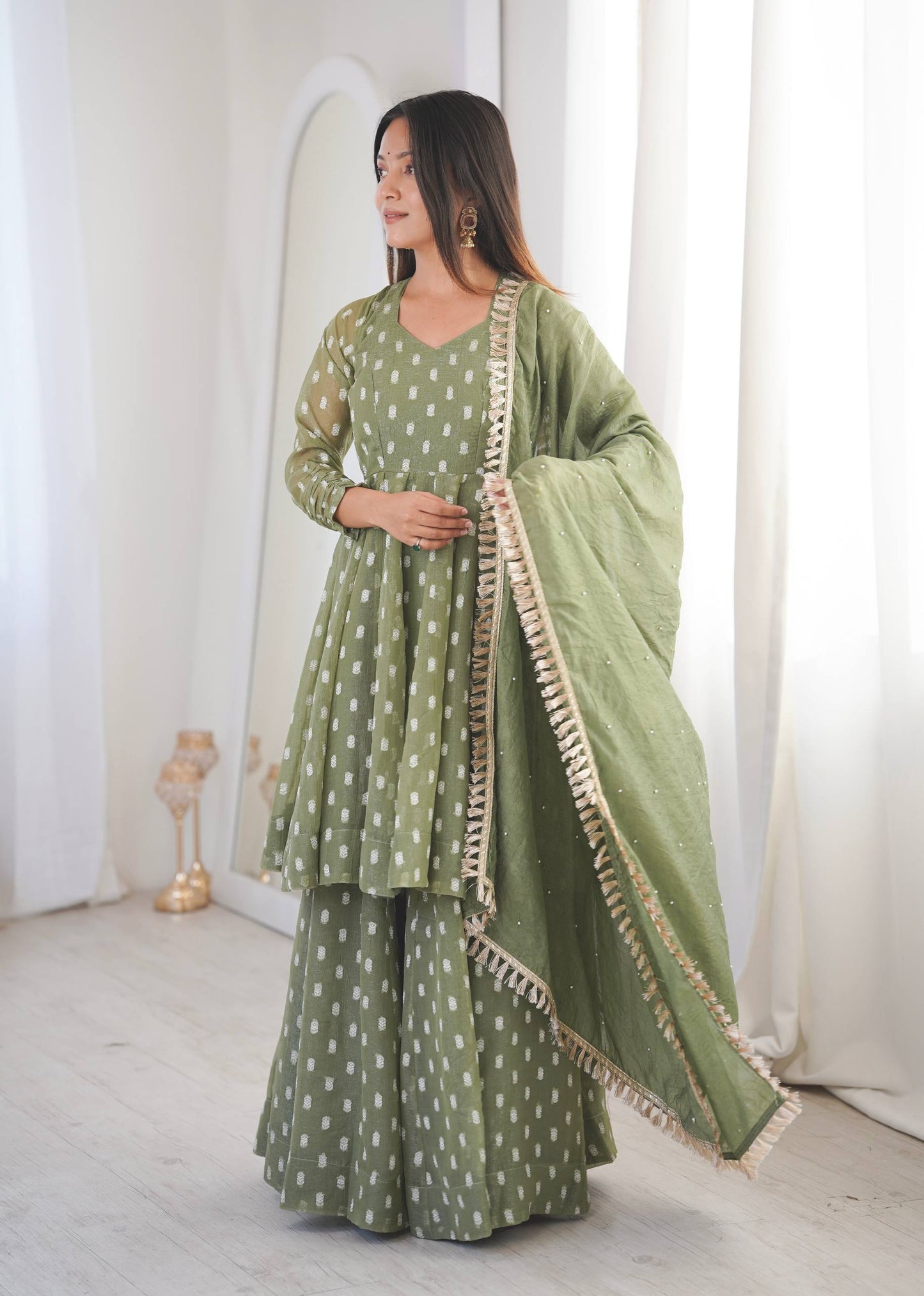 Eyes Catching Green Color Heavy Crunchy Silk Sharara Suit