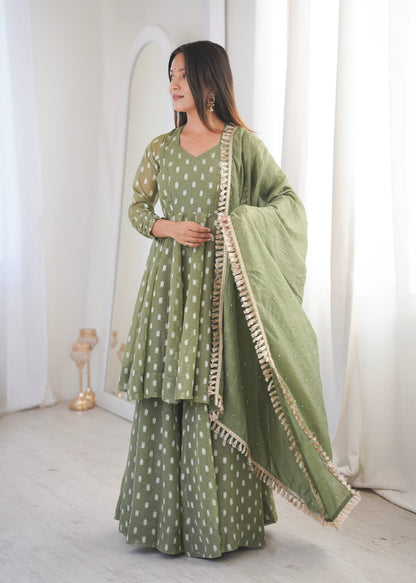 Eyes Catching Green Color Heavy Crunchy Silk Sharara Suit