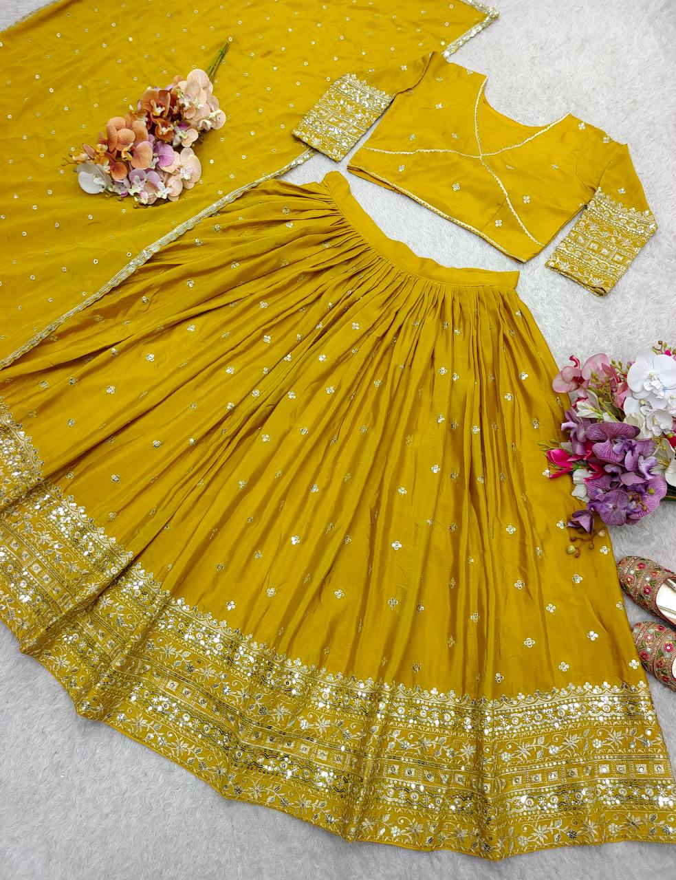 Exclusive Yellow Color Pure Chinon Silk With Heavy Embroidery With Sequence Work Lehenga Choli