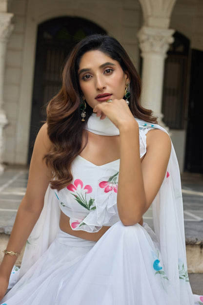 Glorious White Color Soft Georgette Hand Painted Floral Lehenga Choli