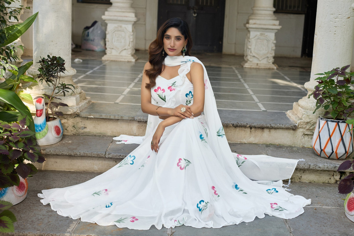 Glorious White Color Soft Georgette Hand Painted Floral Lehenga Choli