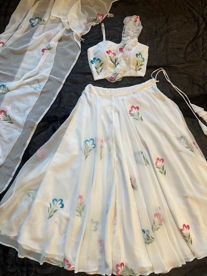 Glorious White Color Soft Georgette Hand Painted Floral Lehenga Choli