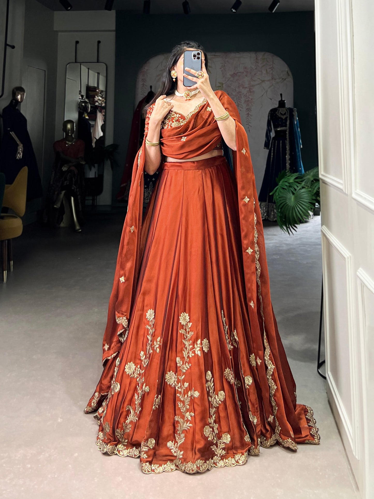 Wedding Wear Orange Color Rangoli Silk With Rich Texture Sequins And Thread Embroidery Work Lehenga Choli