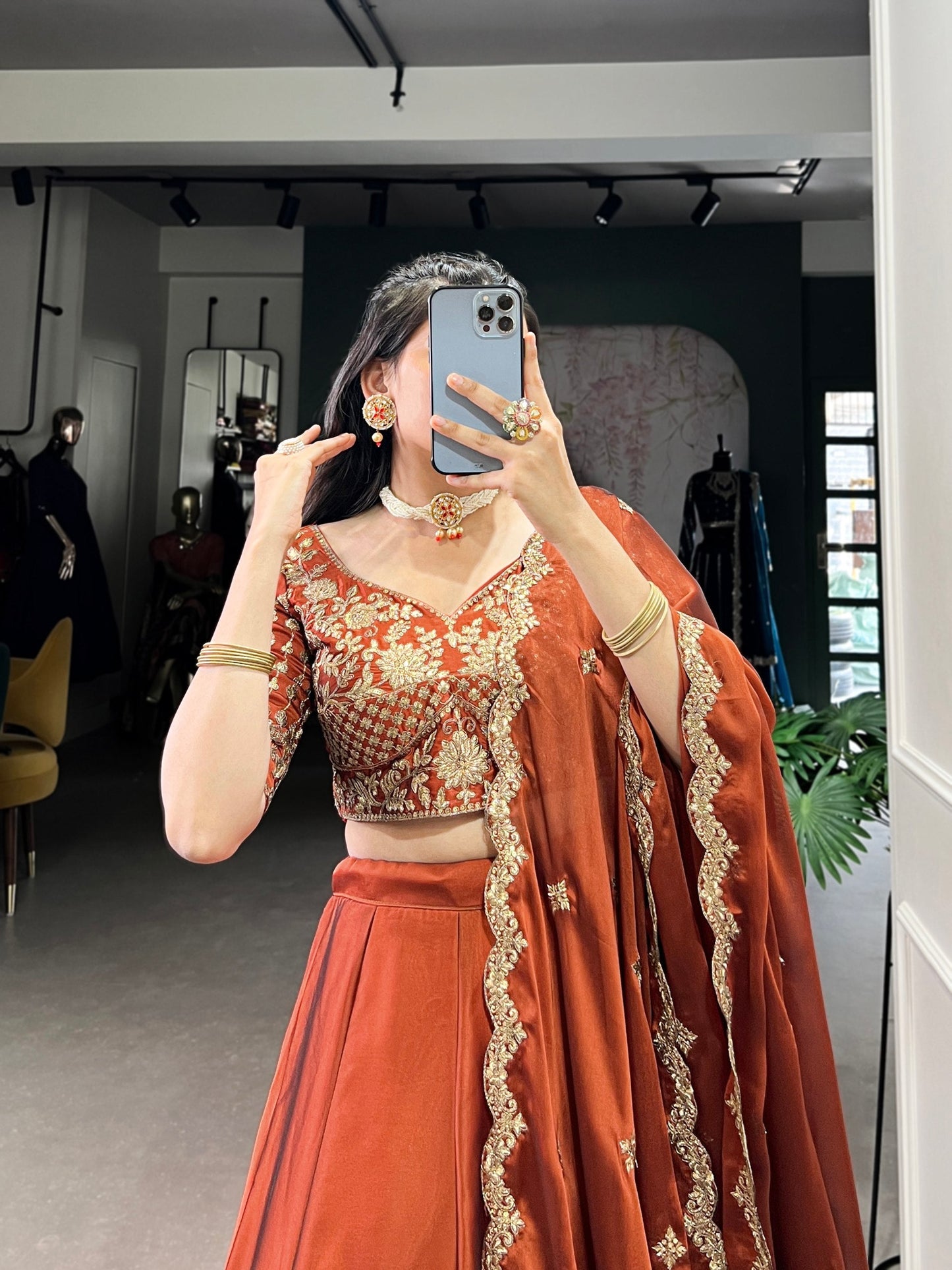 Wedding Wear Orange Color Rangoli Silk With Rich Texture Sequins And Thread Embroidery Work Lehenga Choli