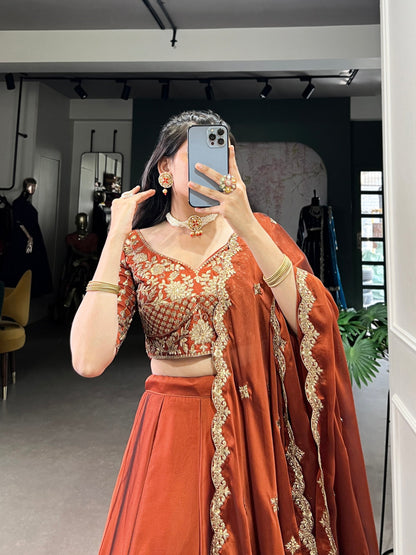 Wedding Wear Orange Color Rangoli Silk With Rich Texture Sequins And Thread Embroidery Work Lehenga Choli