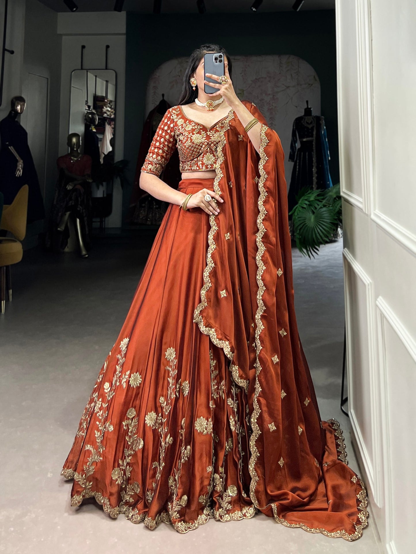 Wedding Wear Orange Color Rangoli Silk With Rich Texture Sequins And Thread Embroidery Work Lehenga Choli
