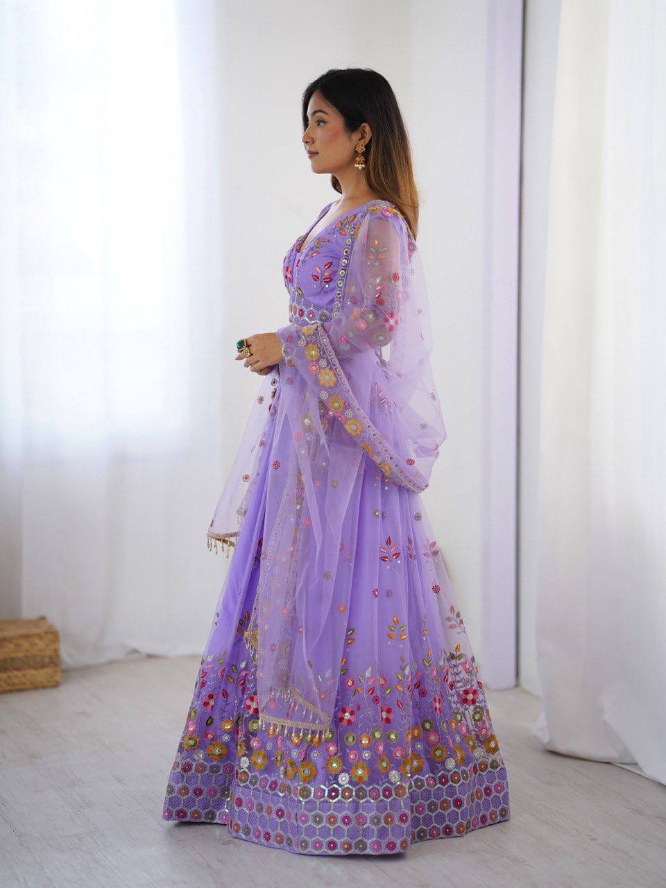 Party Wear Lavender Soft Net Intricate Thread And Sequin Embroidery Work Beautiful Lehenga Choli