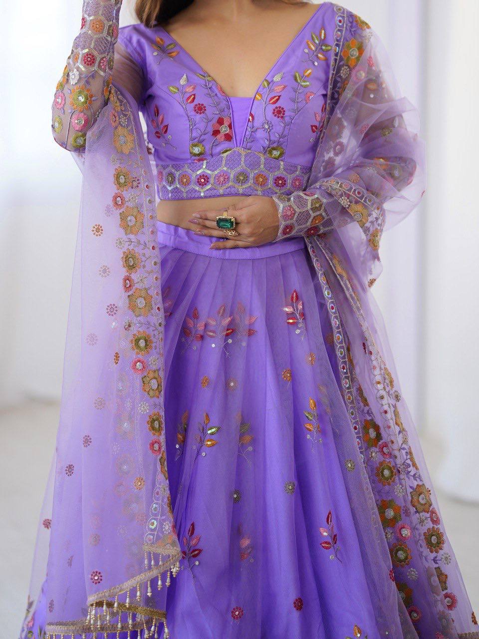 Party Wear Lavender Soft Net Intricate Thread And Sequin Embroidery Work Beautiful Lehenga Choli