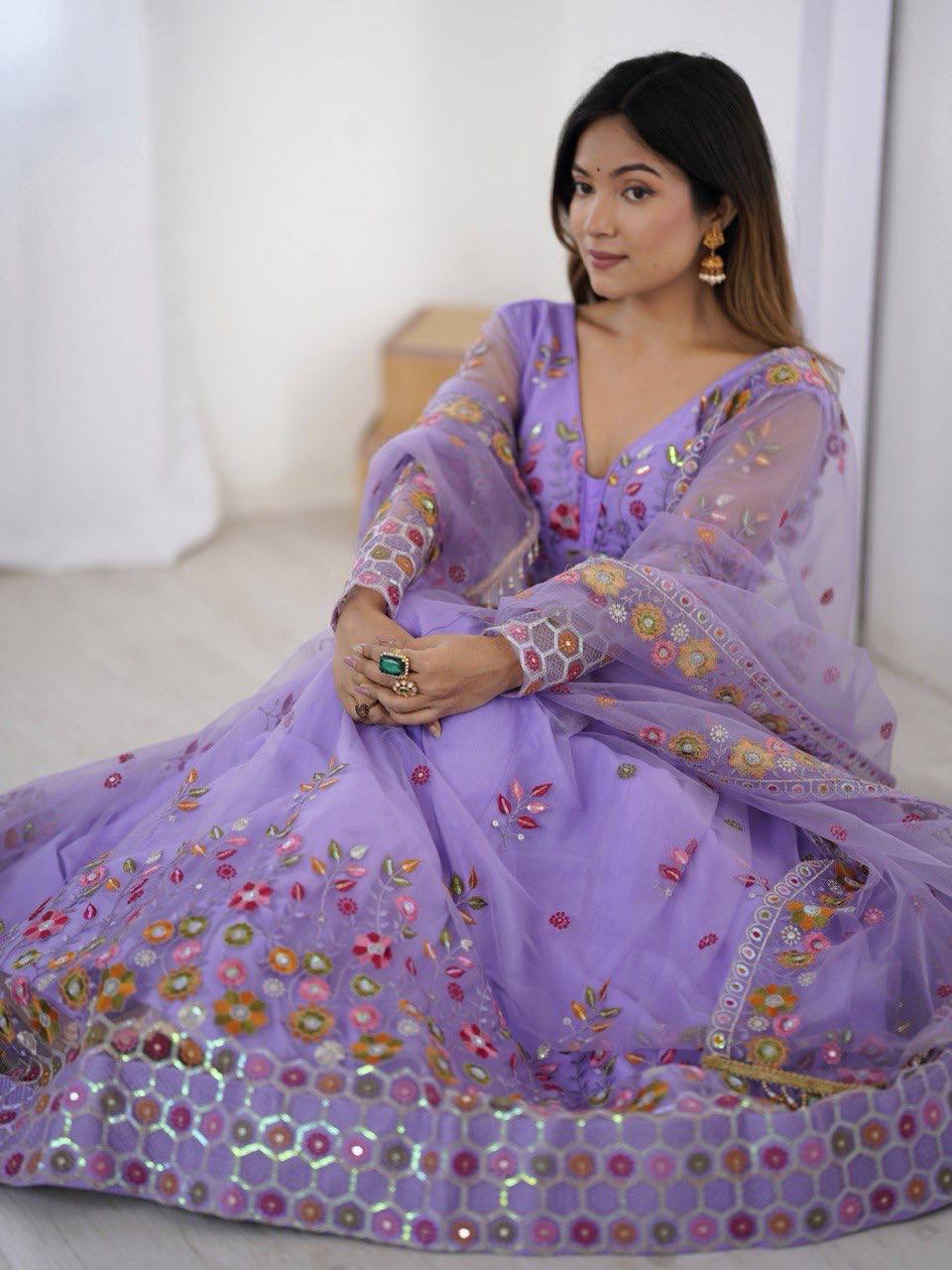 Party Wear Lavender Soft Net Intricate Thread And Sequin Embroidery Work Beautiful Lehenga Choli