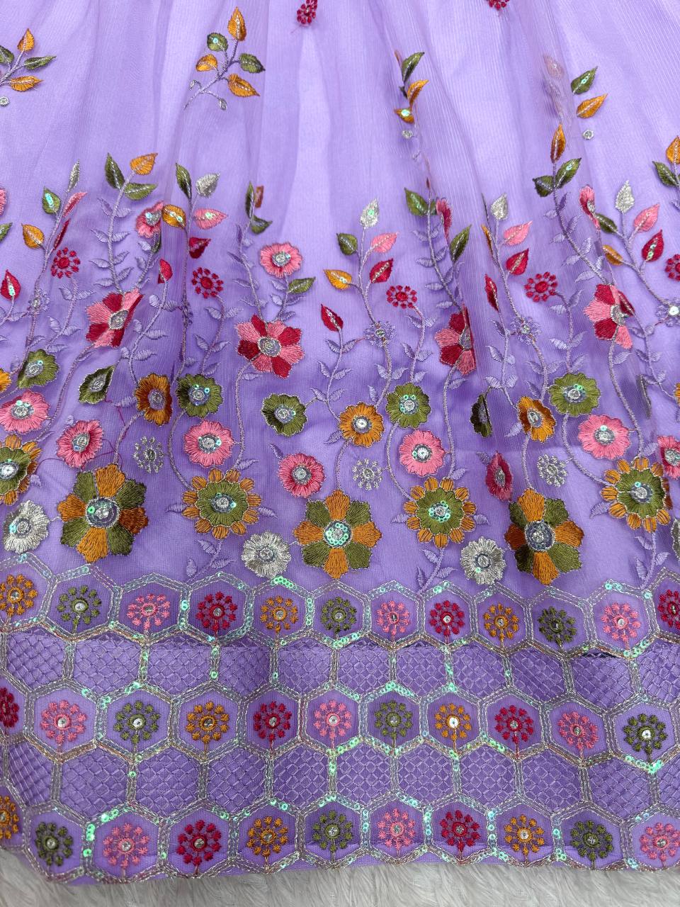 Party Wear Lavender Soft Net Intricate Thread And Sequin Embroidery Work Beautiful Lehenga Choli