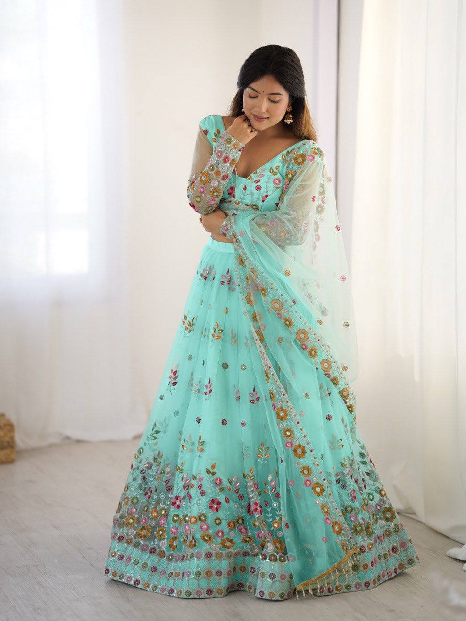 Party Wear Sky Blue Soft Net Intricate Thread And Sequin Embroidery Work Beautiful Lehenga Choli