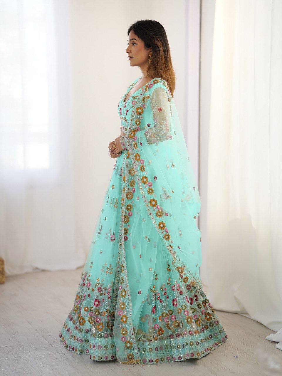 Party Wear Sky Blue Soft Net Intricate Thread And Sequin Embroidery Work Beautiful Lehenga Choli