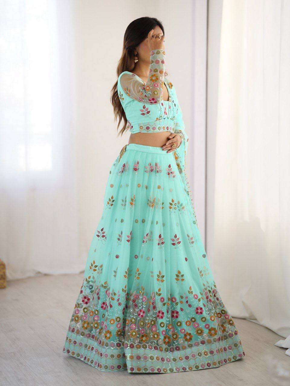 Party Wear Sky Blue Soft Net Intricate Thread And Sequin Embroidery Work Beautiful Lehenga Choli