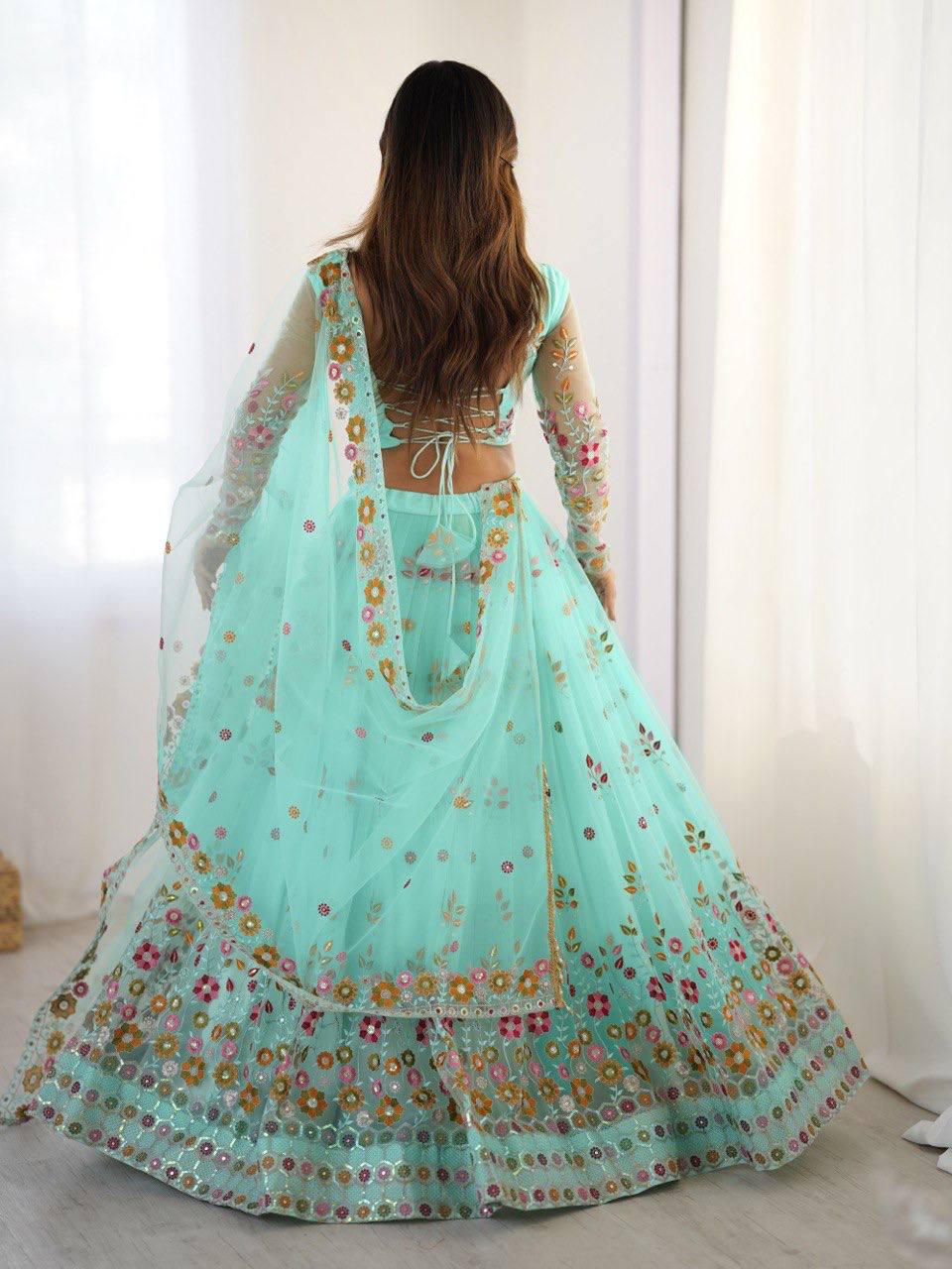Party Wear Sky Blue Soft Net Intricate Thread And Sequin Embroidery Work Beautiful Lehenga Choli
