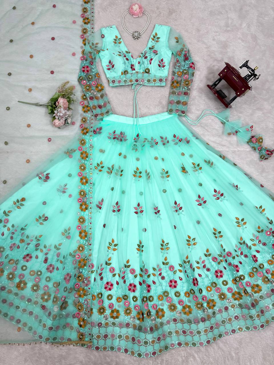 Party Wear Sky Blue Soft Net Intricate Thread And Sequin Embroidery Work Beautiful Lehenga Choli