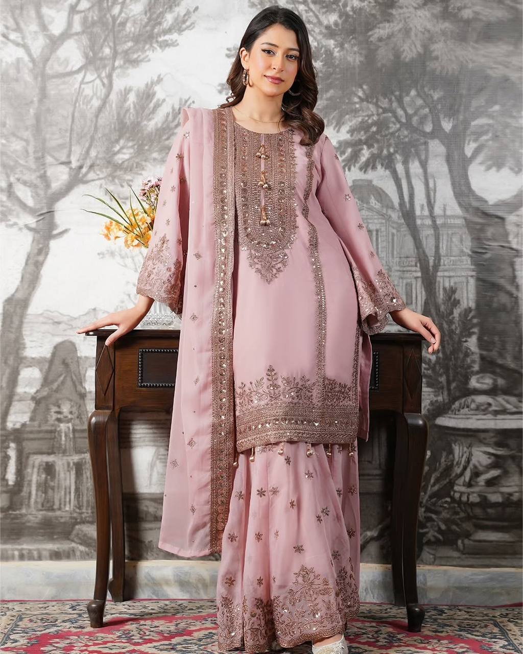 Beautiful Pink Color Heavy Embroidery Sequence Work With Full Flair Sharara Suit
