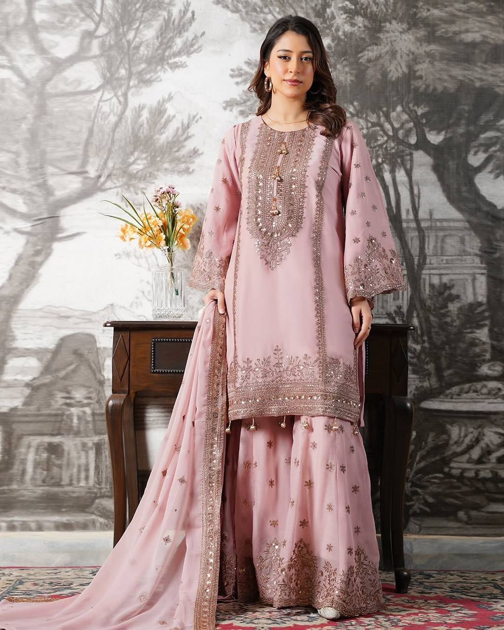 Beautiful Pink Color Heavy Embroidery Sequence Work With Full Flair Sharara Suit