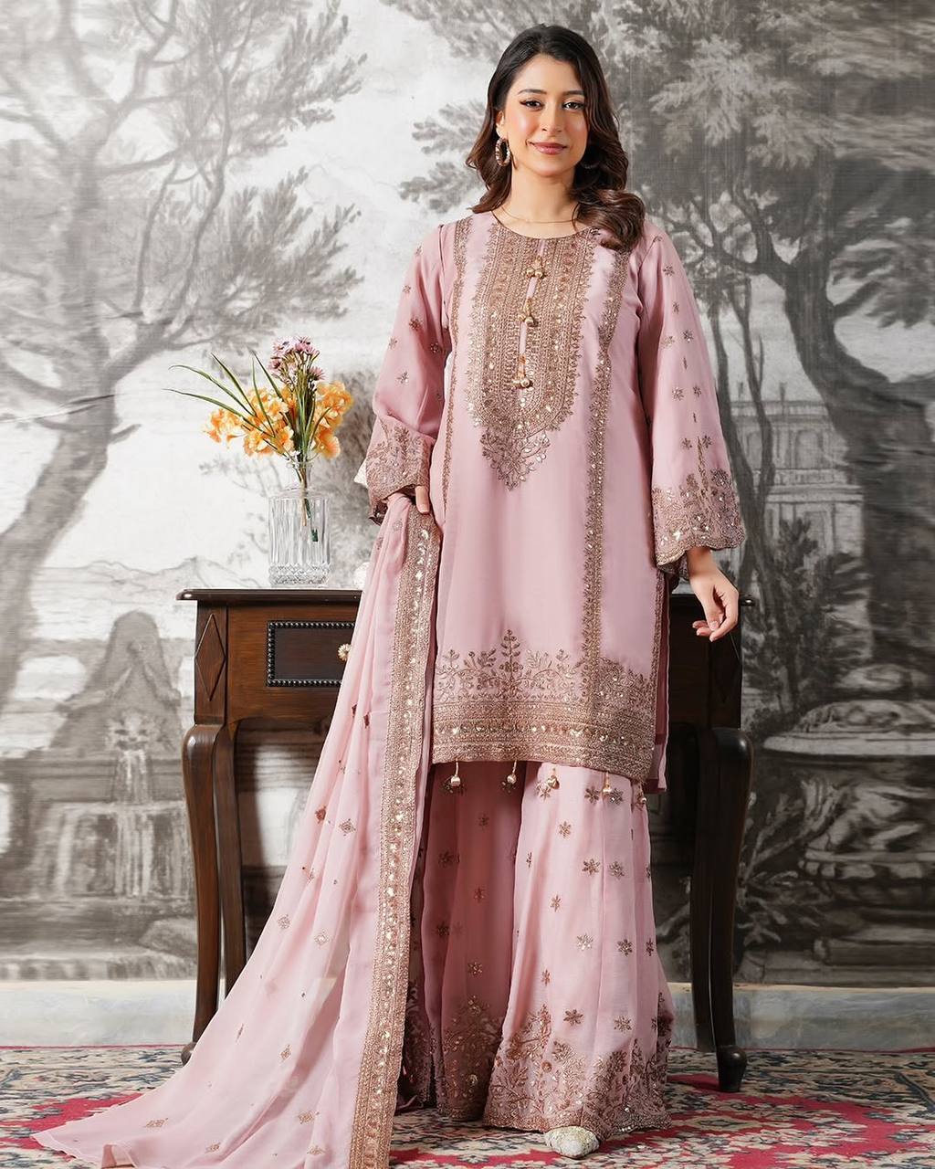Beautiful Pink Color Heavy Embroidery Sequence Work With Full Flair Sharara Suit