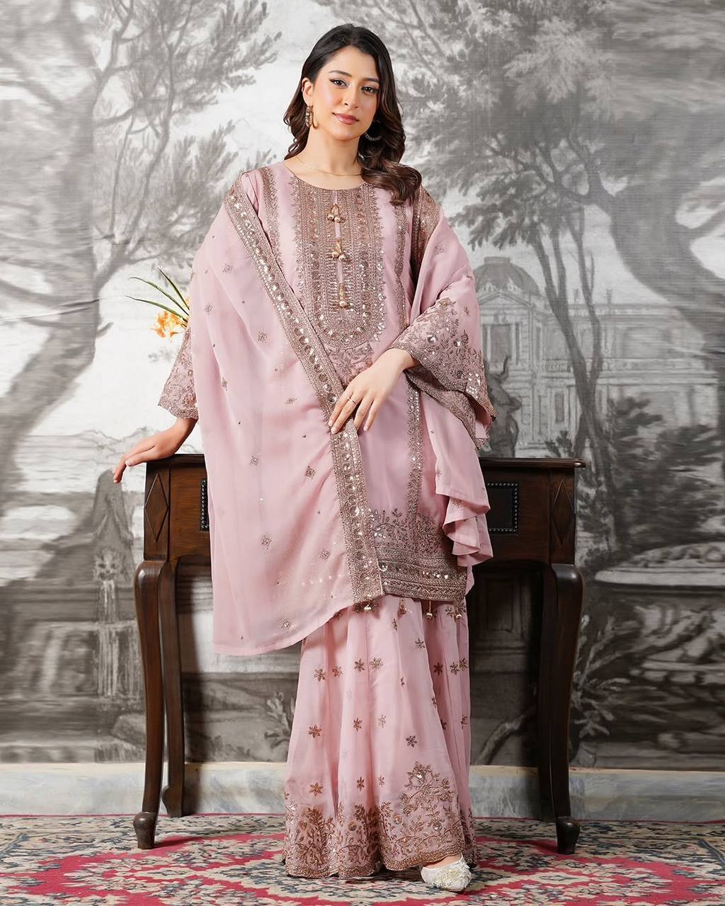 Beautiful Pink Color Heavy Embroidery Sequence Work With Full Flair Sharara Suit
