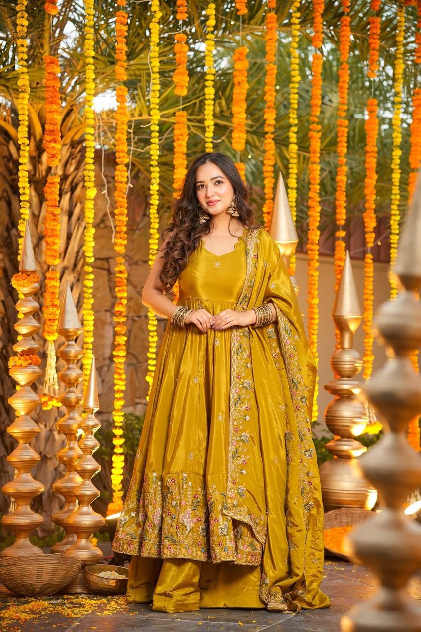 Wedding Wear Mustard Color Heavy Silk Gown Set With Palazzo And Dupatta