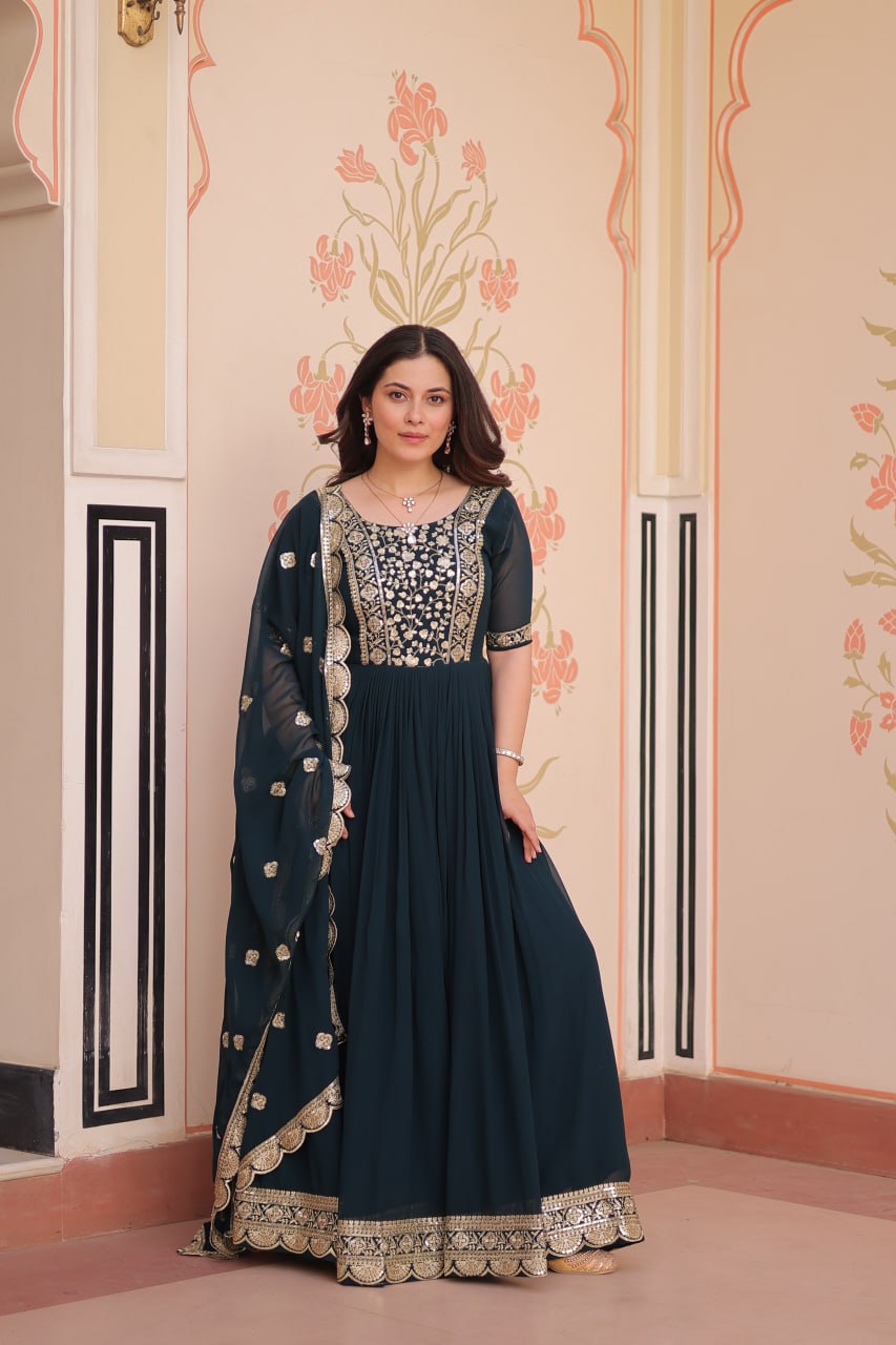 Engagement Wear Black Color Faux Blooming Fabric Adorned With Rich Embroidery Zari And Sequin Work Gown