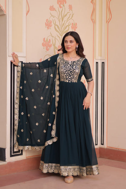 Engagement Wear Black Color Faux Blooming Fabric Adorned With Rich Embroidery Zari And Sequin Work Gown
