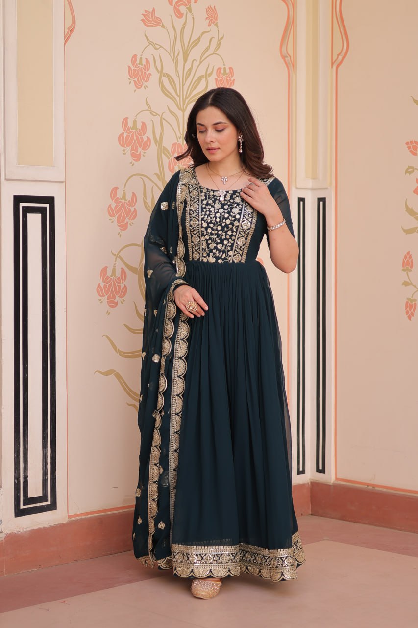 Engagement Wear Black Color Faux Blooming Fabric Adorned With Rich Embroidery Zari And Sequin Work Gown