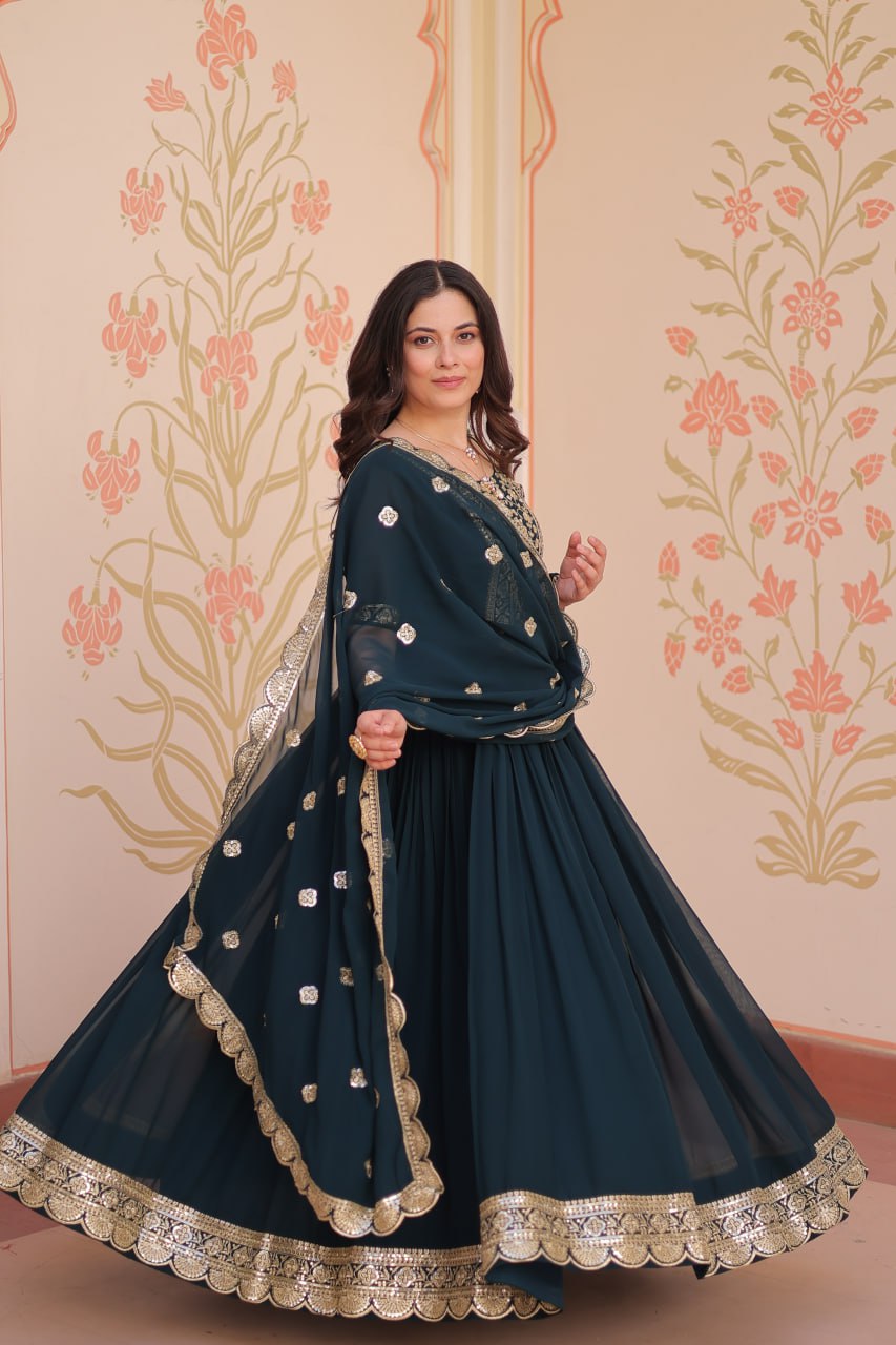 Engagement Wear Black Color Faux Blooming Fabric Adorned With Rich Embroidery Zari And Sequin Work Gown