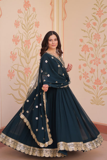 Engagement Wear Black Color Faux Blooming Fabric Adorned With Rich Embroidery Zari And Sequin Work Gown