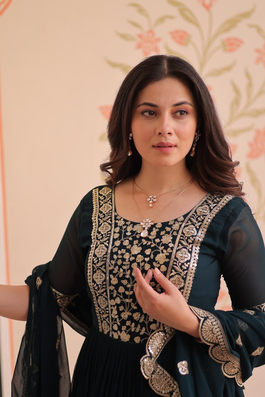 Engagement Wear Black Color Faux Blooming Fabric Adorned With Rich Embroidery Zari And Sequin Work Gown