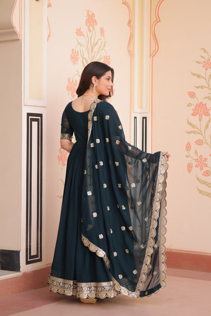 Engagement Wear Black Color Faux Blooming Fabric Adorned With Rich Embroidery Zari And Sequin Work Gown