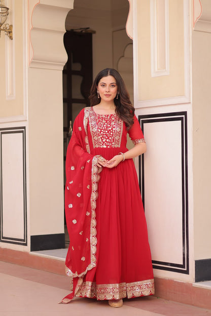 Engagement Wear Red Color Faux Blooming Fabric Adorned With Rich Embroidery Zari And Sequin Work Gown
