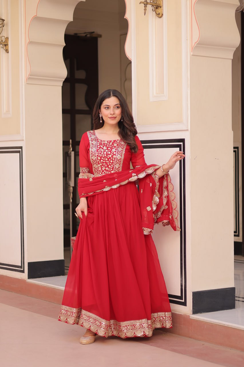 Engagement Wear Red Color Faux Blooming Fabric Adorned With Rich Embroidery Zari And Sequin Work Gown