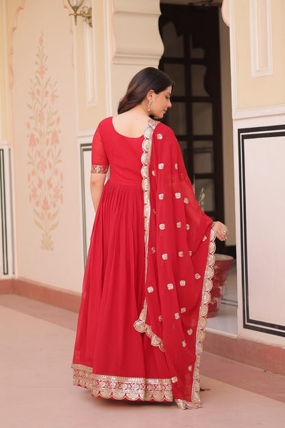 Engagement Wear Red Color Faux Blooming Fabric Adorned With Rich Embroidery Zari And Sequin Work Gown