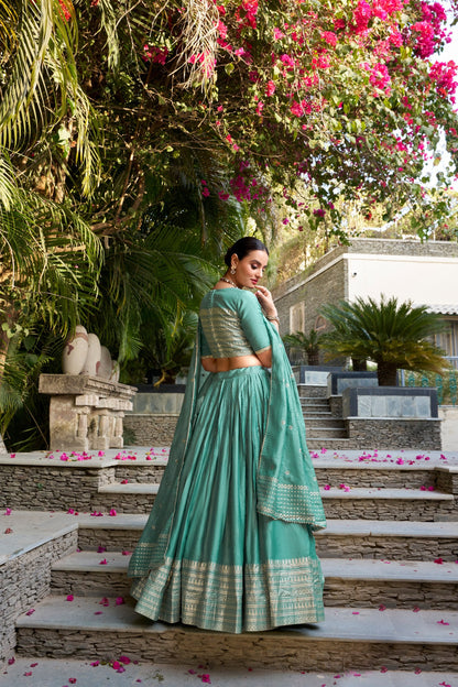 Delightful Aqua Green Pure Chanderi Plain With Zari Weaving Work Border Designer Lehenga Choli